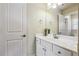 Bright bathroom with a white vanity, white countertops, modern fixtures and ample storage at 2916 Kings Walk Ave, Marietta, GA 30062