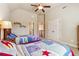 Bedroom with vaulted ceilings, large windows and two beds with fun colorful decor at 2916 Kings Walk Ave, Marietta, GA 30062