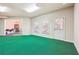Bonus room featuring natural light with ample space, door to exterior, and access to storage at 2916 Kings Walk Ave, Marietta, GA 30062