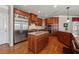 Modern kitchen boasts stainless steel appliances, a kitchen island, and ample cabinet space at 2916 Kings Walk Ave, Marietta, GA 30062