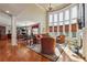 Bright living room featuring hardwood floors, tall windows, and elegant decor at 2916 Kings Walk Ave, Marietta, GA 30062