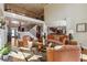 Spacious living room featuring hardwood floors, high ceilings, and views of the staircase and kitchen at 2916 Kings Walk Ave, Marietta, GA 30062