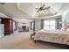 Expansive main bedroom with a fireplace, sitting area, and large windows providing ample light at 2916 Kings Walk Ave, Marietta, GA 30062