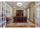 Comfortable office featuring hardwood floors, a large desk, an area rug, and a window at 2916 Kings Walk Ave, Marietta, GA 30062