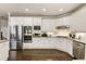 Spacious kitchen with white cabinets, granite countertops, stainless steel appliances, and ample storage at 4235 Iron Duke Ct, Peachtree Corners, GA 30097