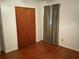 Bedroom featuring hardwood floors, a closet, and natural light at 2374 Woodcastle Se Ln, Atlanta, GA 30316