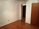 Bedroom featuring hardwood floors, a closet, and neutral-colored walls at 2374 Woodcastle Se Ln, Atlanta, GA 30316