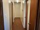Long hallway with beautiful wood flooring and neutral-colored walls at 2374 Woodcastle Se Ln, Atlanta, GA 30316