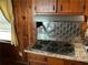 Vintage kitchen range with stainless steel hood at 2374 Woodcastle Se Ln, Atlanta, GA 30316