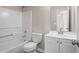 Bathroom featuring a shower-tub combo and a vanity with a white countertop and cabinet at 3649 Salem Glen Rd, Lithonia, GA 30038