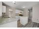 Bright kitchen with white cabinetry, gray countertops, stainless steel appliances at 3649 Salem Glen Rd, Lithonia, GA 30038