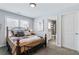 Inviting bedroom with natural light and an adjacent bathroom at 4160 Tilly Mill Rd, Atlanta, GA 30360