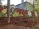 Artistically painted fence adding a unique and colorful touch to the property at 4160 Tilly Mill Rd, Atlanta, GA 30360