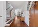 Inviting foyer with hardwood floors and a staircase leading to the second floor at 4160 Tilly Mill Rd, Atlanta, GA 30360