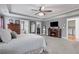 Inviting main bedroom features a fireplace, tray ceilings, and adjoins the main bath at 4160 Tilly Mill Rd, Atlanta, GA 30360