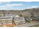 Aerial view of a neighborhood showcasing multiple homes and tree-lined streets at 4308 Southside Dr, Acworth, GA 30101