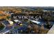 Aerial view shows Acworth, GA near roads, rail and trees at 4308 Southside Dr, Acworth, GA 30101