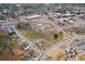 Aerial view of townhomes, commercial buildings and nearby park at 4308 Southside Dr, Acworth, GA 30101