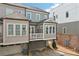 Rear exterior of the home showcasing a private balcony and garage access at 4308 Southside Dr, Acworth, GA 30101