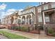 Beautiful home exterior with a covered porch, brick accents, and manicured lawn at 4308 Southside Dr, Acworth, GA 30101