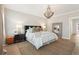 Spacious main bedroom with stylish decor and a large decorative mirror at 4308 Southside Dr, Acworth, GA 30101