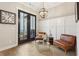 Cozy sitting room featuring stylish furnishings, shiplap accent wall, and light hardwood flooring at 4308 Southside Dr, Acworth, GA 30101