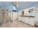 Bright bathroom featuring a walk-in shower, double vanity, and light blue walls at 4742 Balmoral Ne Way, Marietta, GA 30068