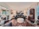 Cozy living room with stylish furnishings, a decorative rug, and bright natural light from the windows at 4742 Balmoral Ne Way, Marietta, GA 30068