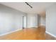 Expansive living area with hardwood floors, recessed lighting, and neutral color scheme at 799 Hammond Dr # 219, Atlanta, GA 30328