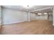 Large basement space with hardwood floors, recessed lighting, and plenty of room for activities at 145 Cedarwood Ln, Roswell, GA 30075