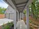 Covered breezeway connecting the garage to the main house, providing a stylish and functional walkway at 145 Cedarwood Ln, Roswell, GA 30075