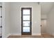 Contemporary front door with glass panels allowing natural light at 145 Cedarwood Ln, Roswell, GA 30075