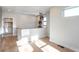 Hallway features wooden floors and decorative lighting at 145 Cedarwood Ln, Roswell, GA 30075