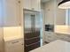 Modern kitchen with stainless steel refrigerator and white cabinetry at 145 Cedarwood Ln, Roswell, GA 30075