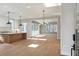 Open concept living space with hardwood floors and lots of natural light at 145 Cedarwood Ln, Roswell, GA 30075