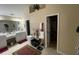 A bathroom featuring a vanity area with tiled flooring and walk-in closet at 25 Horseshoe Ct, Covington, GA 30014