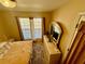 Bedroom featuring windows, carpet, and a dresser at 25 Horseshoe Ct, Covington, GA 30014