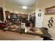 Well-equipped kitchen featuring granite countertops and stainless steel appliances at 25 Horseshoe Ct, Covington, GA 30014