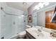 Modern bathroom featuring a glass-enclosed shower, updated vanity, and contemporary finishes at 1980 Two Springs Way, Lawrenceville, GA 30043