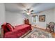 Cozy bedroom with a ceiling fan and hardwood flooring, providing comfort and charm at 1980 Two Springs Way, Lawrenceville, GA 30043