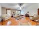 Open-concept living room with vaulted ceilings, hardwood floors, and ample natural light at 1980 Two Springs Way, Lawrenceville, GA 30043