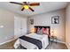 Nicely appointed bedroom with a ceiling fan and convenient closet access at 2139 Hickory Se Bnd # E, Conyers, GA 30013