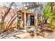 Brick home featuring a welcoming front door with sidelights and a covered porch at 2139 Hickory Se Bnd # E, Conyers, GA 30013