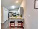 Eat-in kitchen with stainless steel appliances and modern cabinetry at 2139 Hickory Se Bnd # E, Conyers, GA 30013