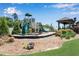 Community playground with slides, climbing structures, and a gazebo, perfect for Gathering fun at 2964 Perimeter Cir, Buford, GA 30519