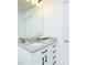 Bathroom featuring a modern vanity with black pulls and granite countertop at 361 17Th St # 2122, Atlanta, GA 30363