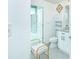 A bathroom with a toilet and a door leading into a closet at 361 17Th St # 2122, Atlanta, GA 30363