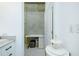 Bright office with a desk, concrete walls, and adjacent storage at 361 17Th St # 2122, Atlanta, GA 30363