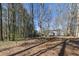 Expansive backyard showcasing mature trees and beautiful natural surroundings at 3271 Sutcliffe Nw Rdg, Marietta, GA 30064