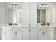 Dual sink bathroom featuring a makeup vanity at 906 Bingham St, Woodstock, GA 30188